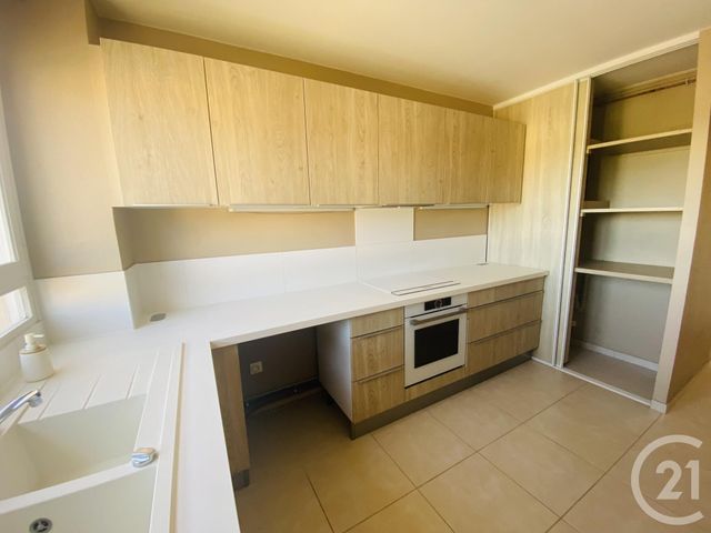 Appartement F2 à louer - 2 pièces - 50.17 m2 - MAUREPAS - 78 - ILE-DE-FRANCE - Century 21 S.L.P. Immobilier